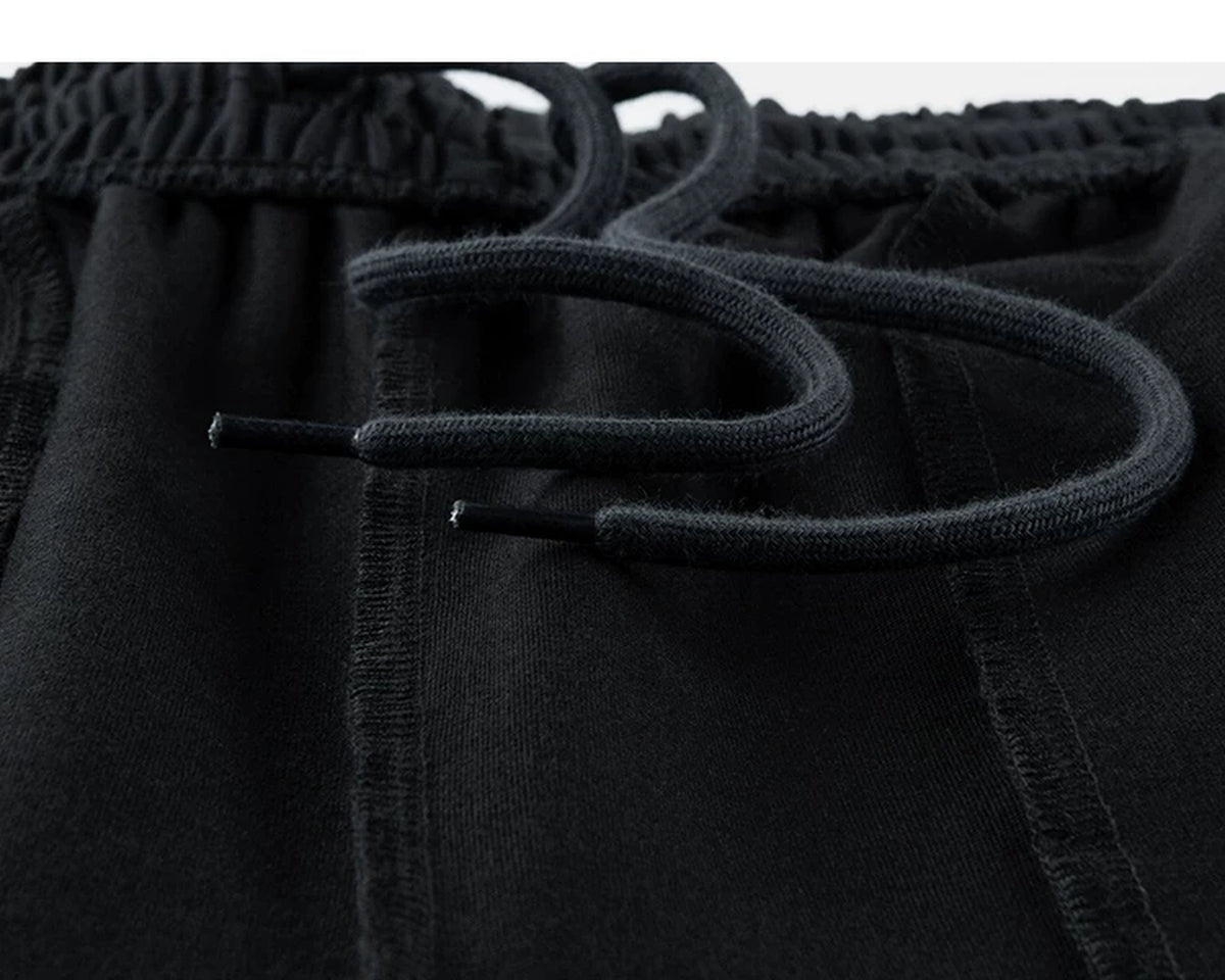 IDLT wide leg trousers, black inner drawstring.