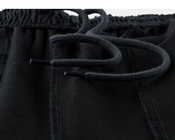 IDLT wide leg trousers, black inner drawstring.