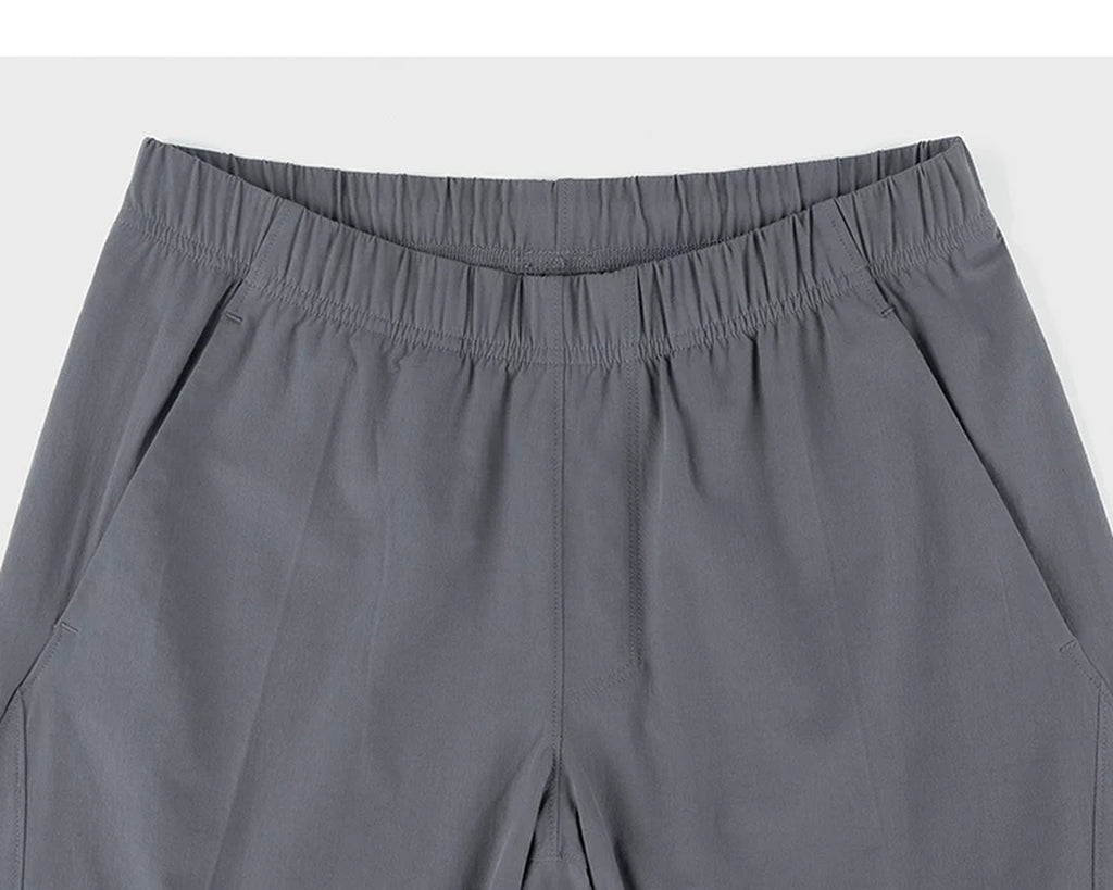 IDLT shorts, gray waistband.