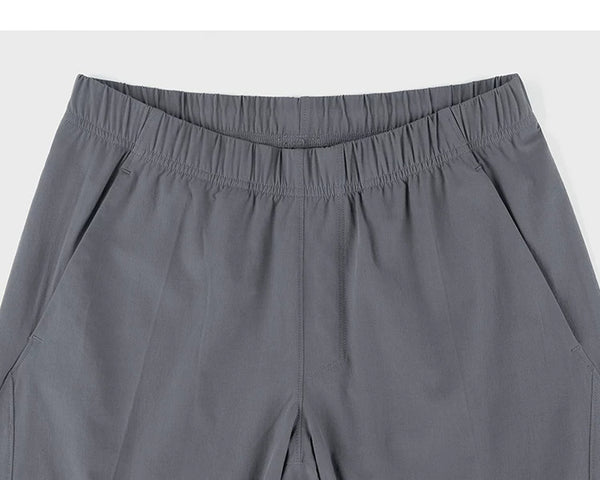 IDLT shorts, gray waistband.