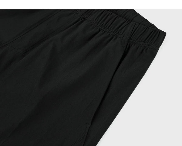 IDLT shorts, black side pocket.