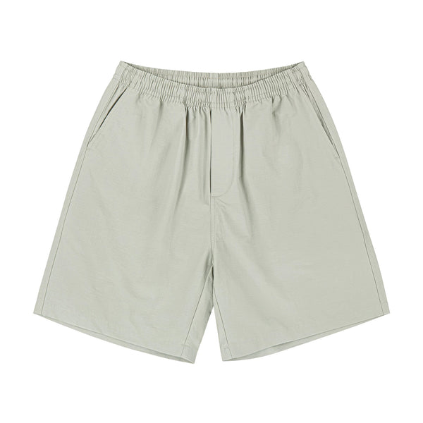 IDLT shorts, beige front.