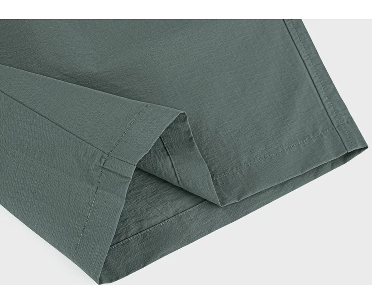 IDLT shorts, green folded hem.