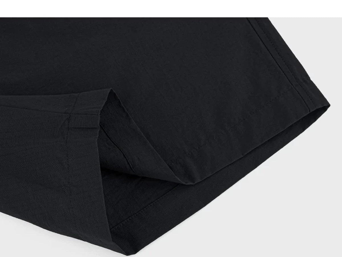 IDLT shorts, black folded hem.