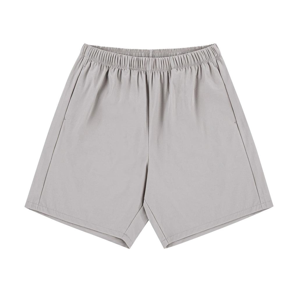 IDLT shorts, beige front.