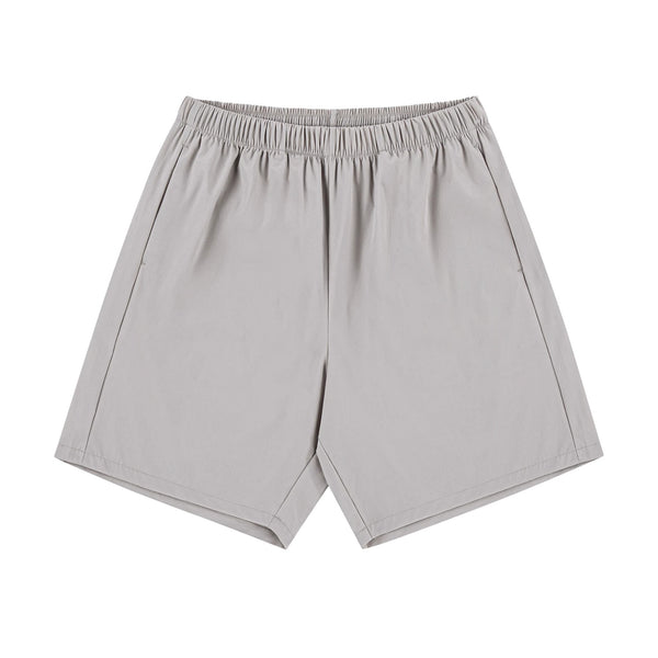 IDLT shorts, beige front.