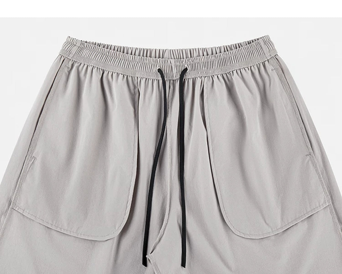 IDLT shorts, beige inner pockets.