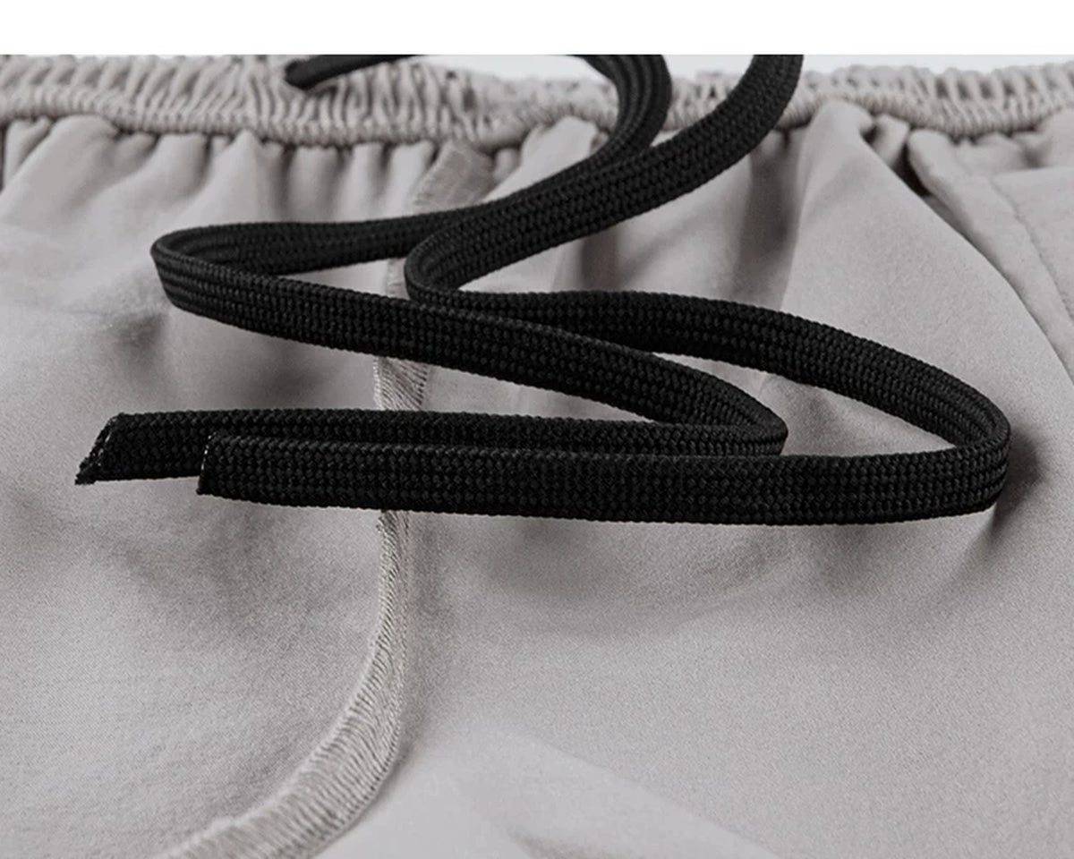 IDLT shorts, beige inner drawstring.
