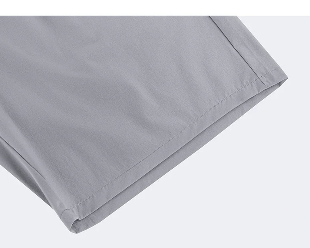 IDLT shorts, light gray hem stitching.
