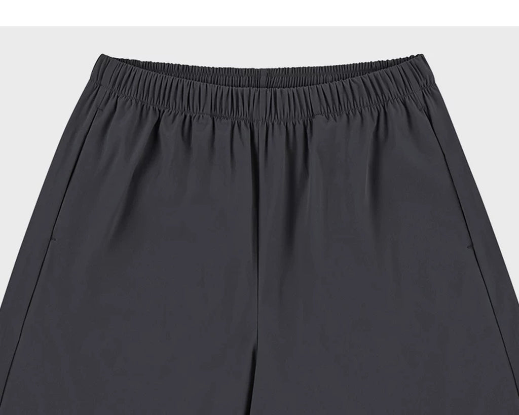 IDLT shorts, dark gray waistband.