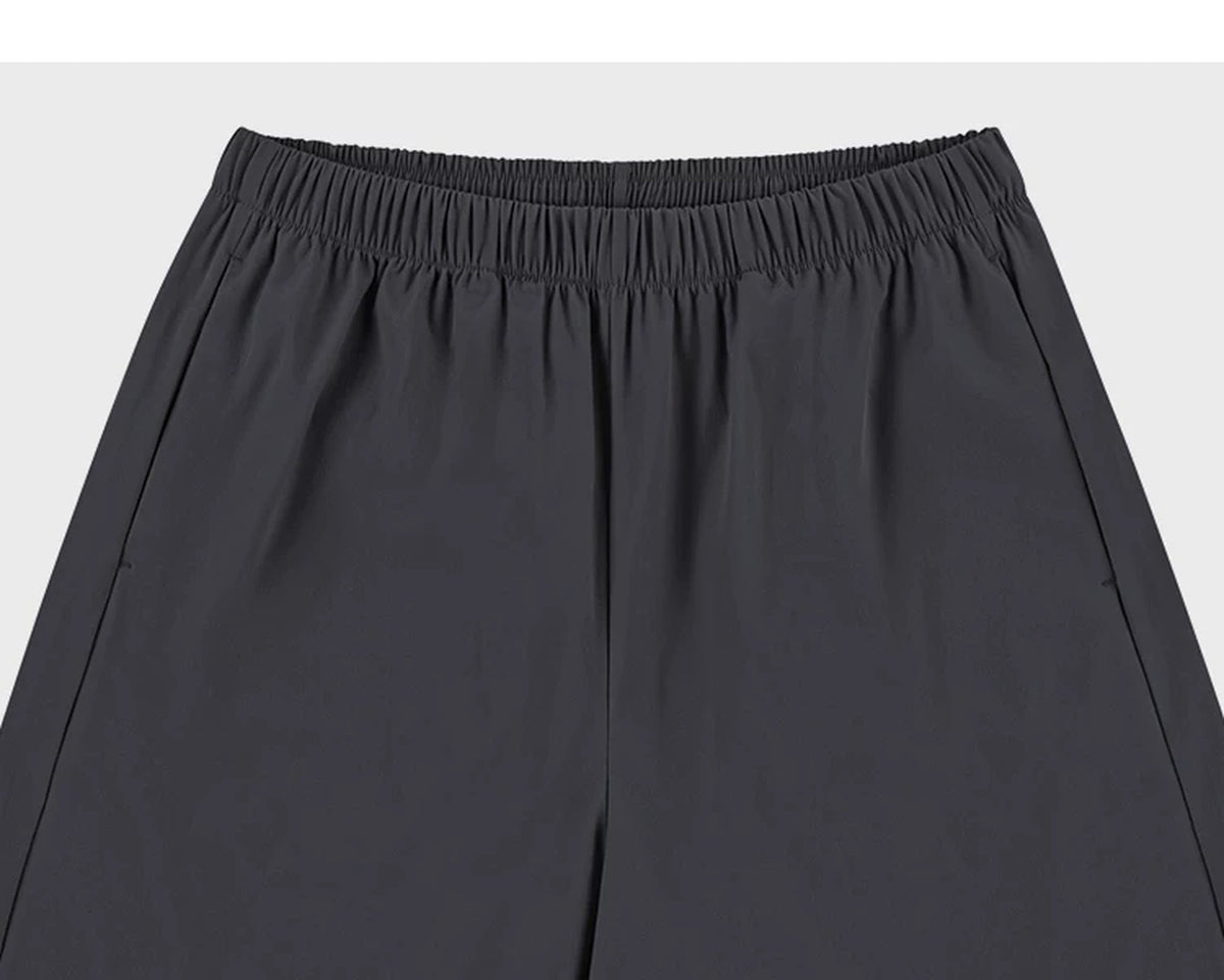 IDLT shorts, dark gray waistband.
