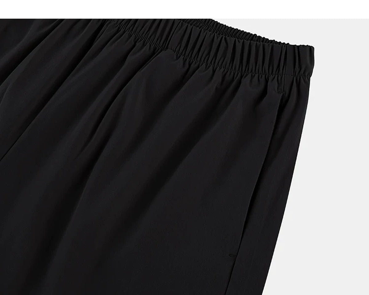 IDLT shorts, black side pocket.