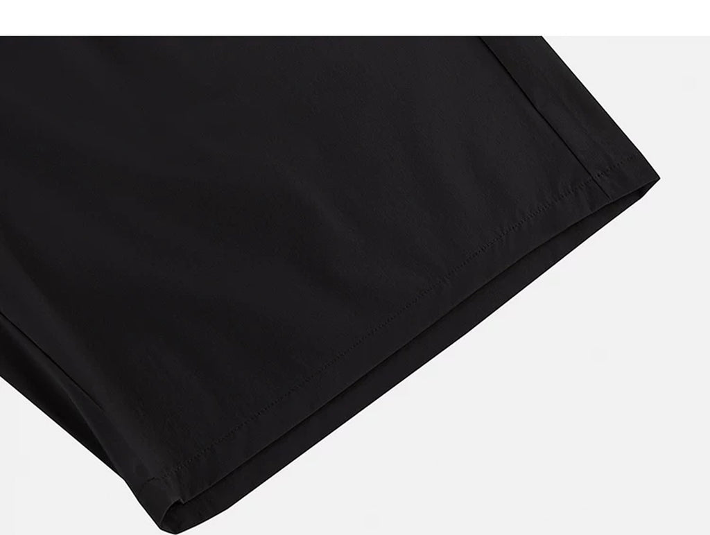 IDLT shorts, black hem stitching.