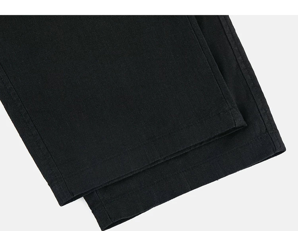 IDLT trousers, black leg hems.