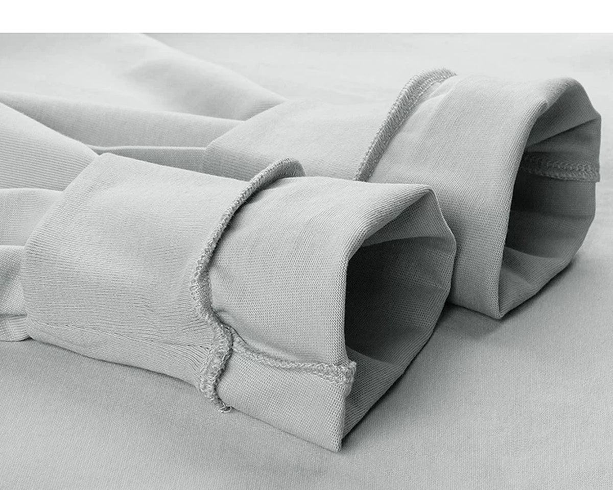 IDLT mock neck long sleeve top, light gray turned cuffs.