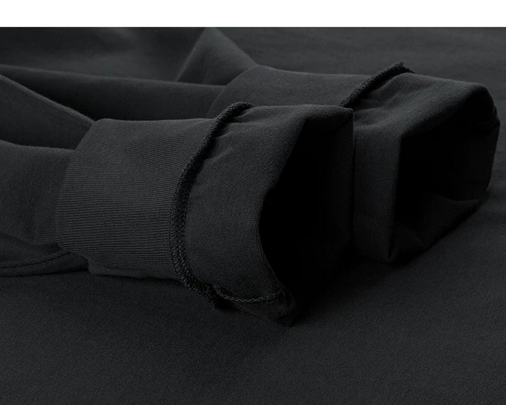 IDLT mock neck long sleeve top, black turned cuffs.