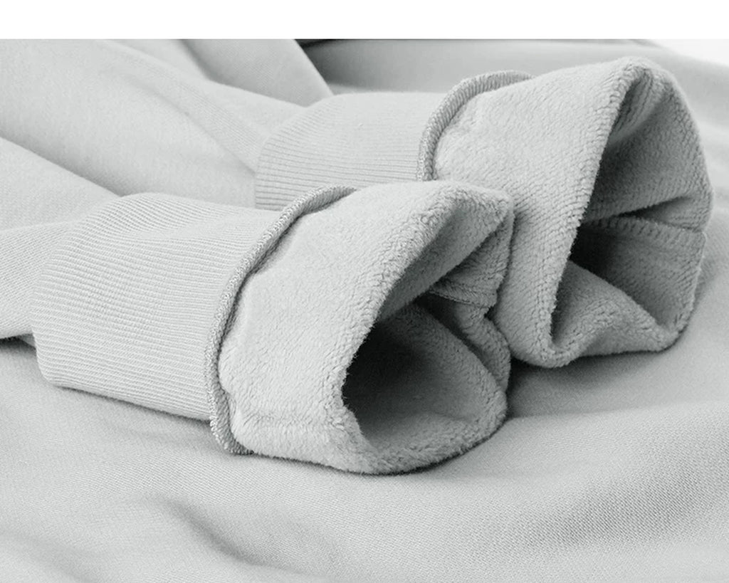 IDLT sweatshirt, light gray turned cuffs.