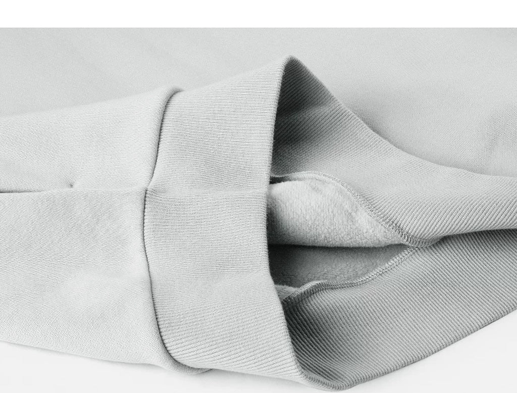 IDLT sweatshirt, light gray folded ribbed hem.