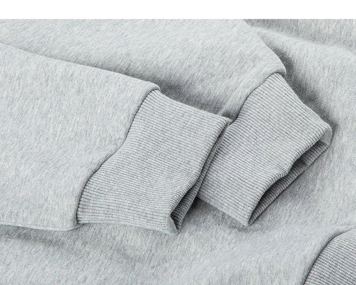 IDLT sweatshirt, heather gray ribbed cuffs.