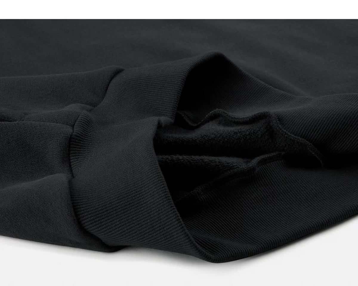 IDLT sweatshirt, black folded ribbed hem.