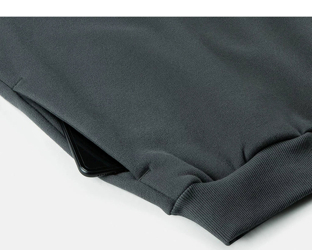 IDLT hoodie, dark gray side pocket.