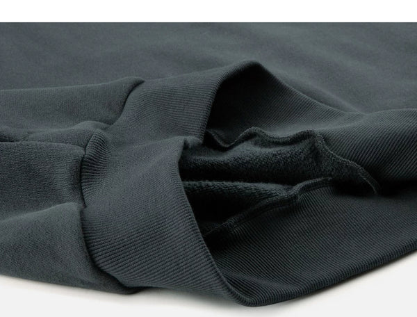 IDLT hoodie, dark gray folded hem.
