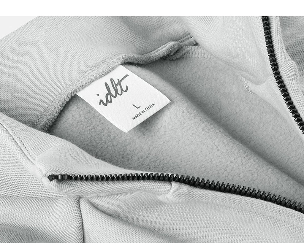 IDLT zip sweatshirt, light gray neckline label.