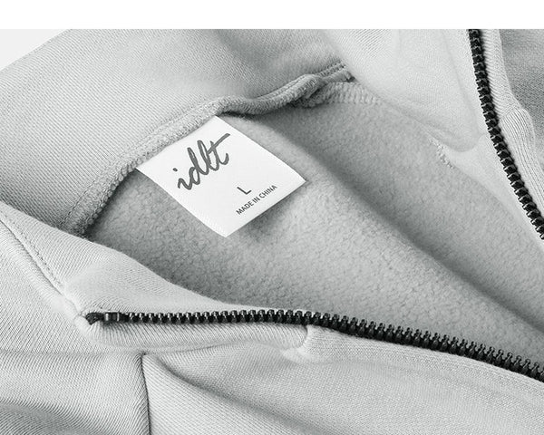 IDLT zip sweatshirt, light gray neckline label.