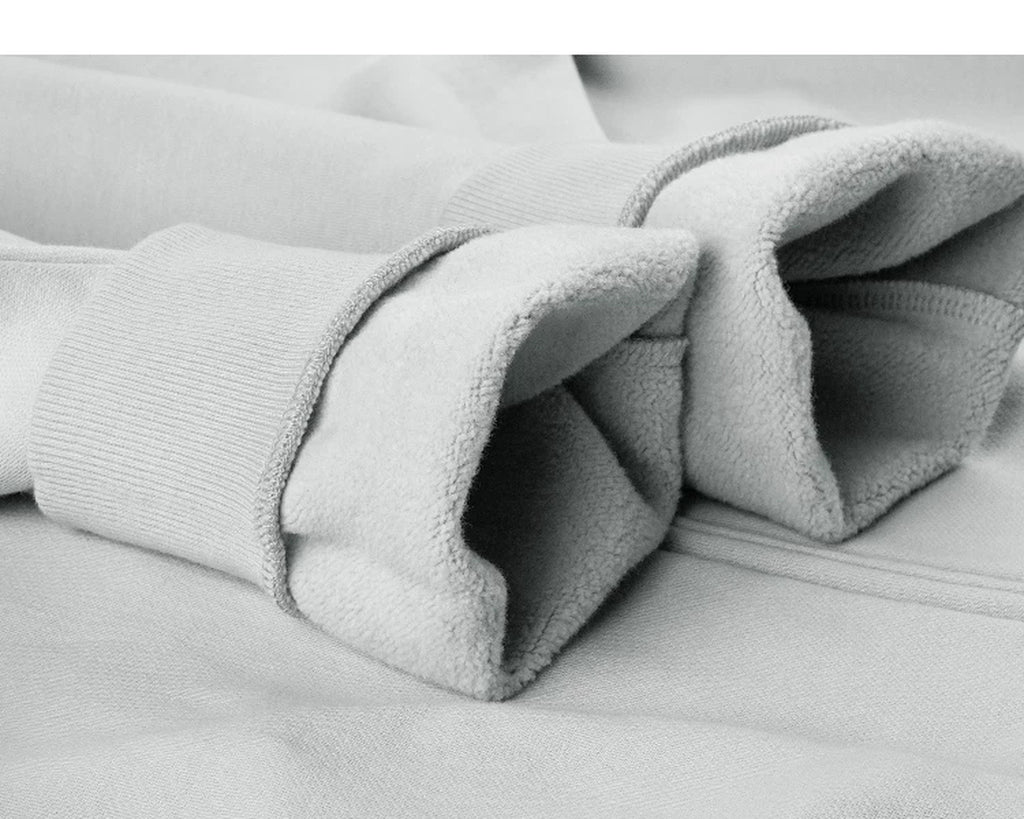 IDLT zip sweatshirt, light gray turned cuffs.