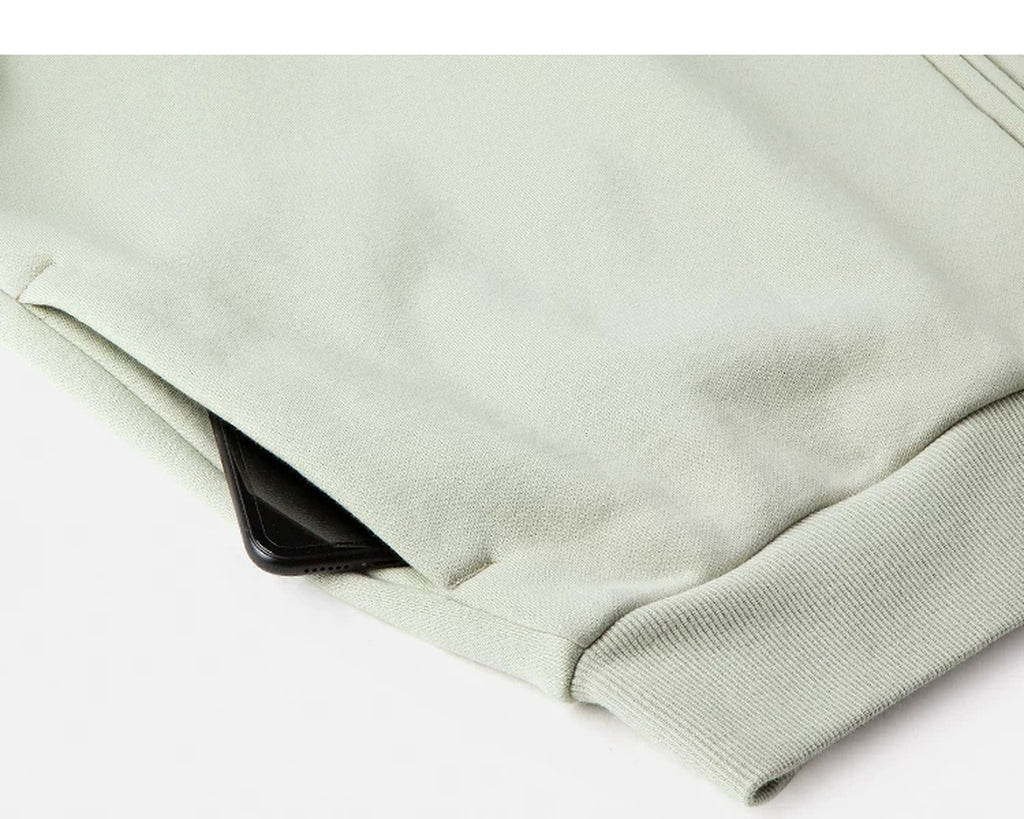 IDLT zip sweatshirt, sage green side pocket.