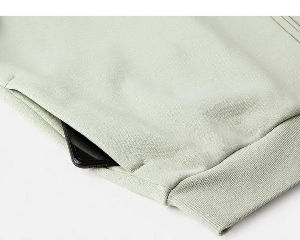 IDLT zip sweatshirt, sage green side pocket.