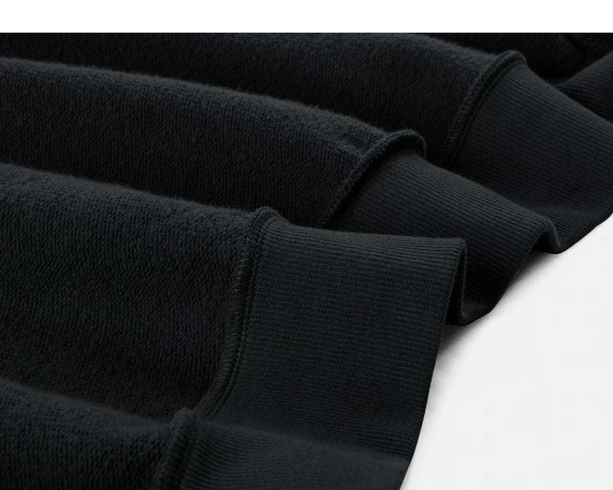 IDLT zip sweatshirt, black fleece fabric and cuffs.