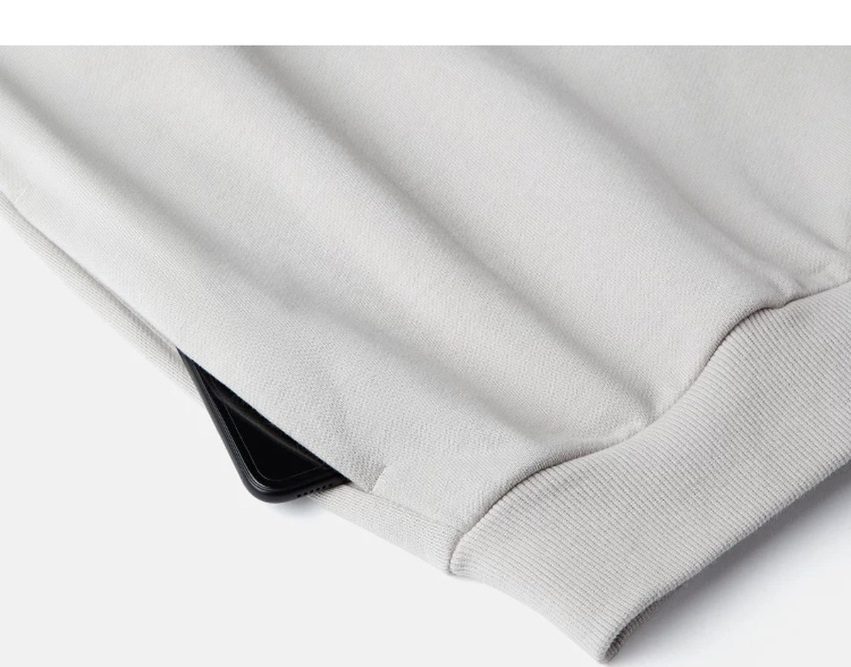 IDLT hoodie, cream side pocket.