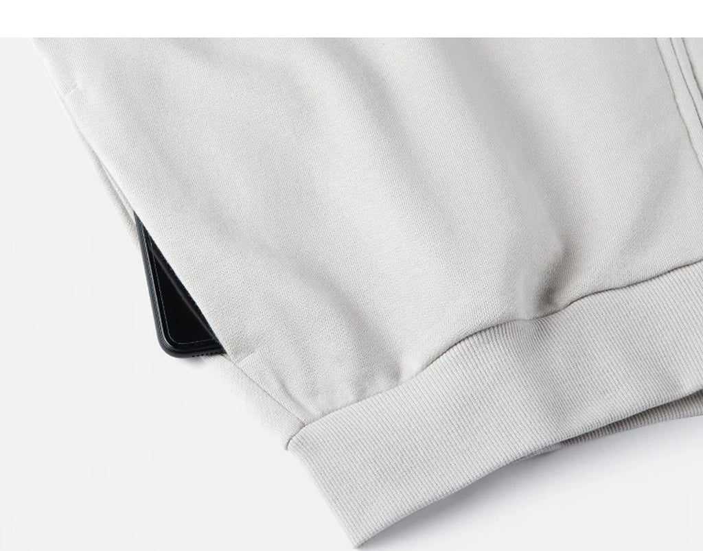 IDLT zip sweatshirt, cream side pocket.
