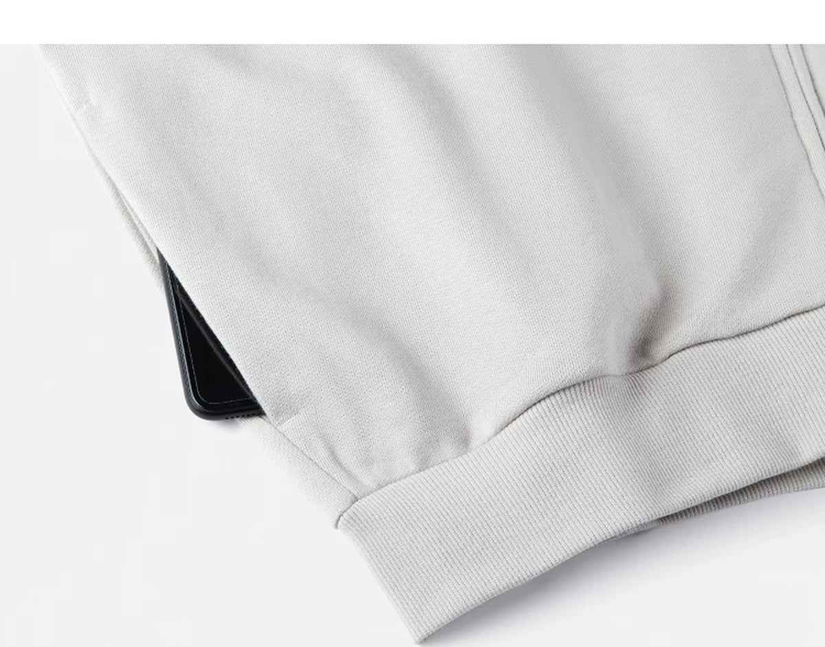 IDLT zip sweatshirt, cream side pocket.