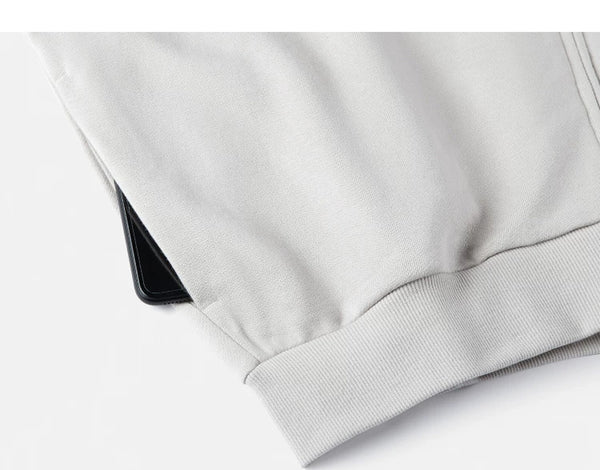 IDLT zip sweatshirt, cream side pocket.