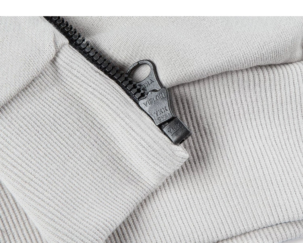 IDLT zip sweatshirt, cream lower zipper.