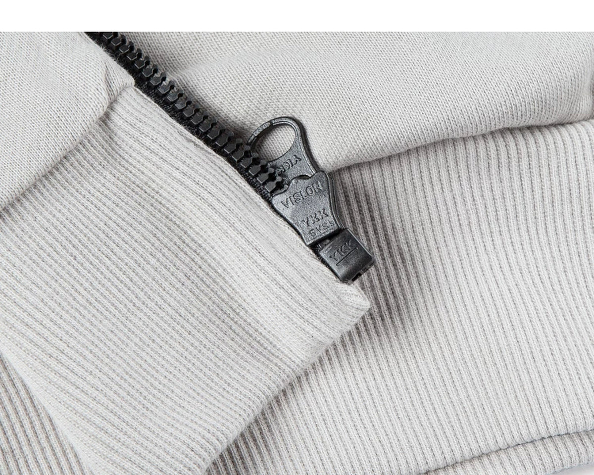 IDLT zip sweatshirt, cream lower zipper.