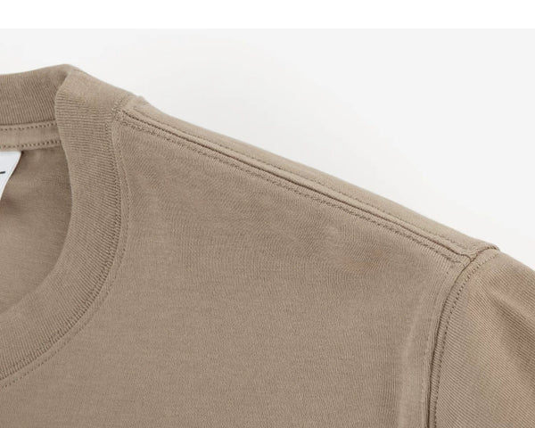 IDLT T-shirt, beige shoulder seam.
