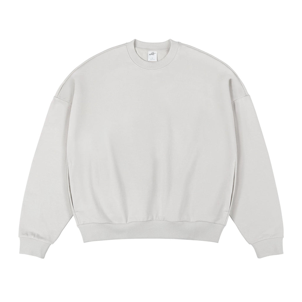 IDLT sweatshirt, cream front.