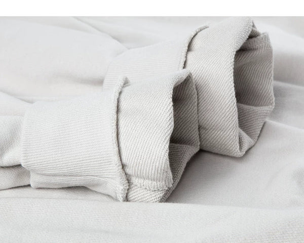 IDLT sweatshirt, cream turned cuffs.