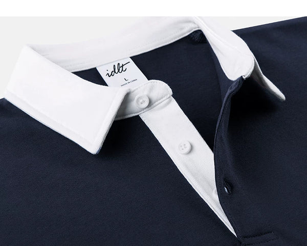 IDLT contrast collar polo, navy collar and buttons.