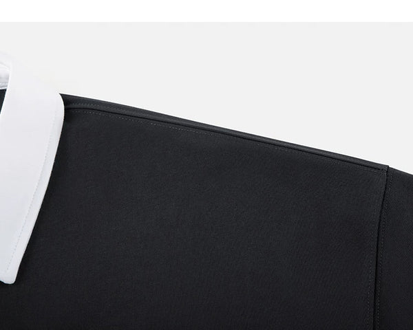 IDLT contrast collar polo, black shoulder seam.