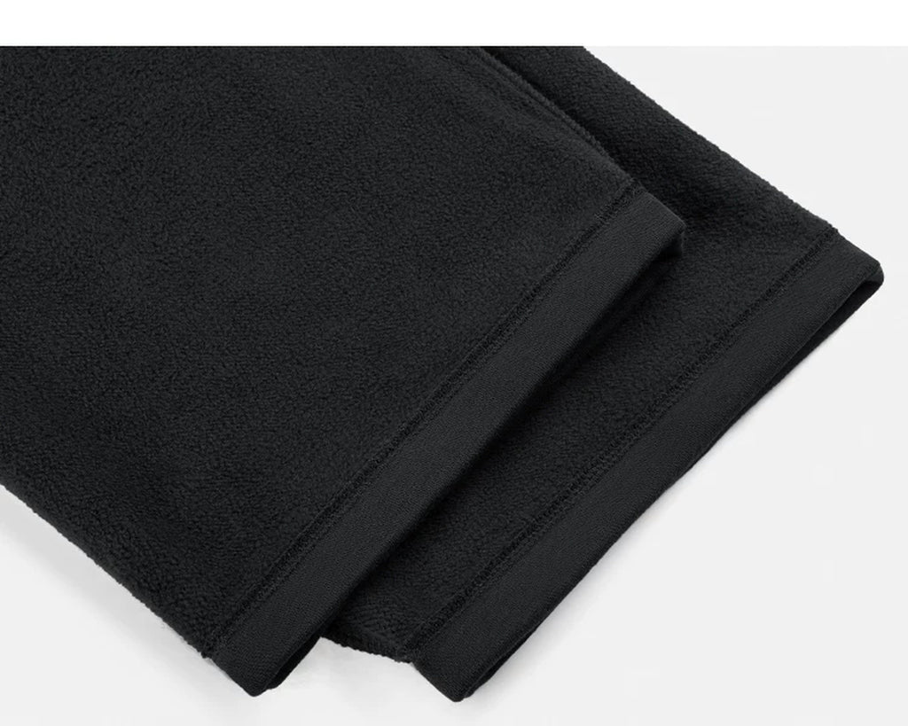 IDLT sweatpants, black leg hems.