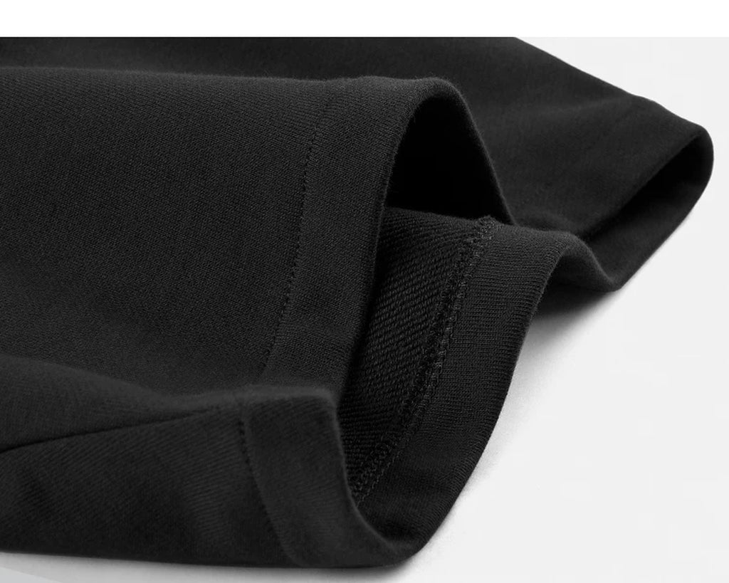 IDLT sweat shorts, black folded hem.