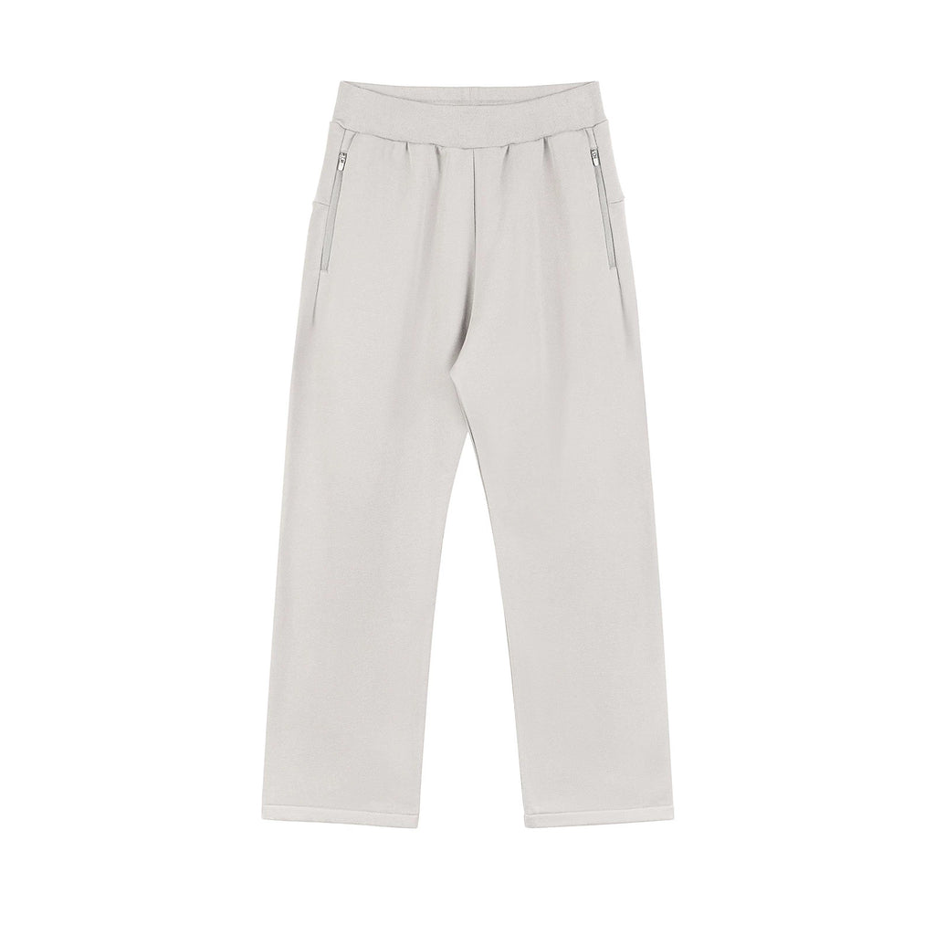 IDLT sweatpants, cream front.