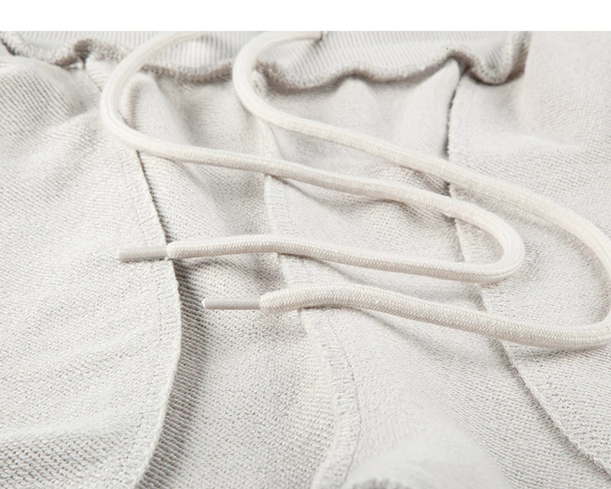 IDLT sweatpants, cream inner drawstring.