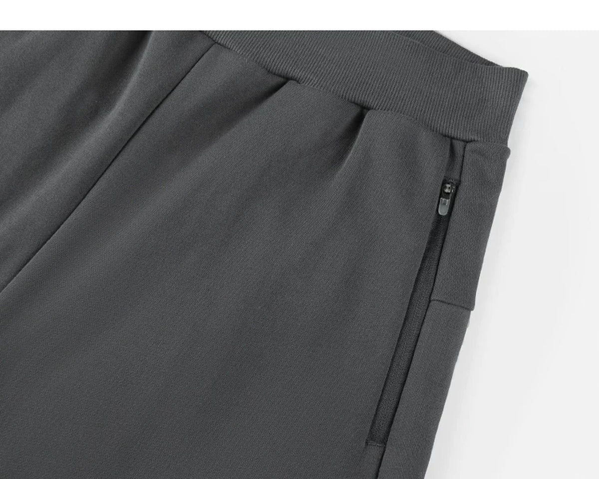 IDLT sweatpants, dark gray side pocket.