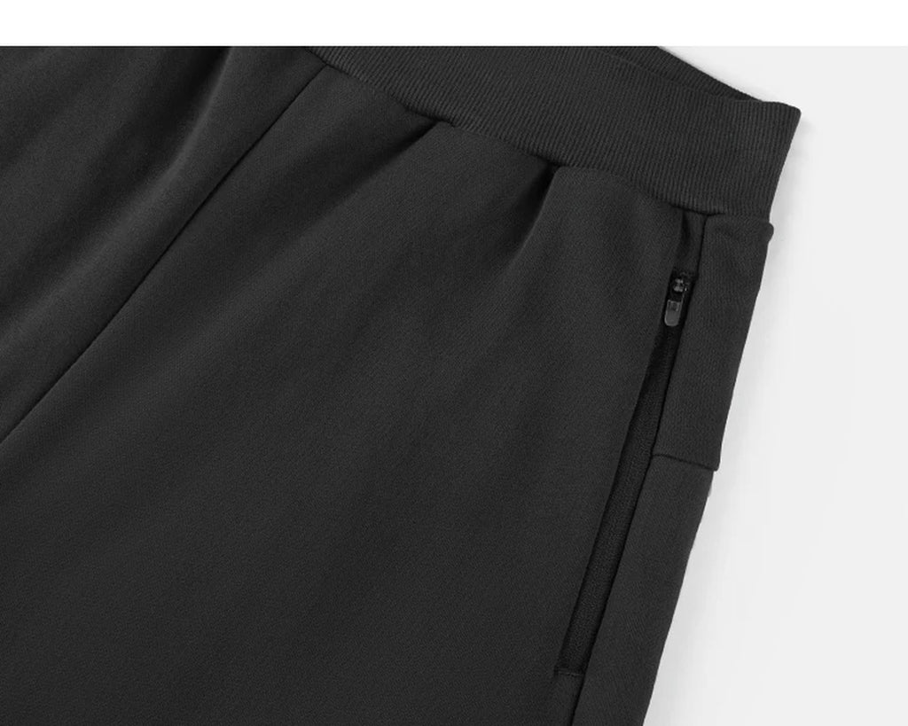 IDLT sweatpants, black side pocket.