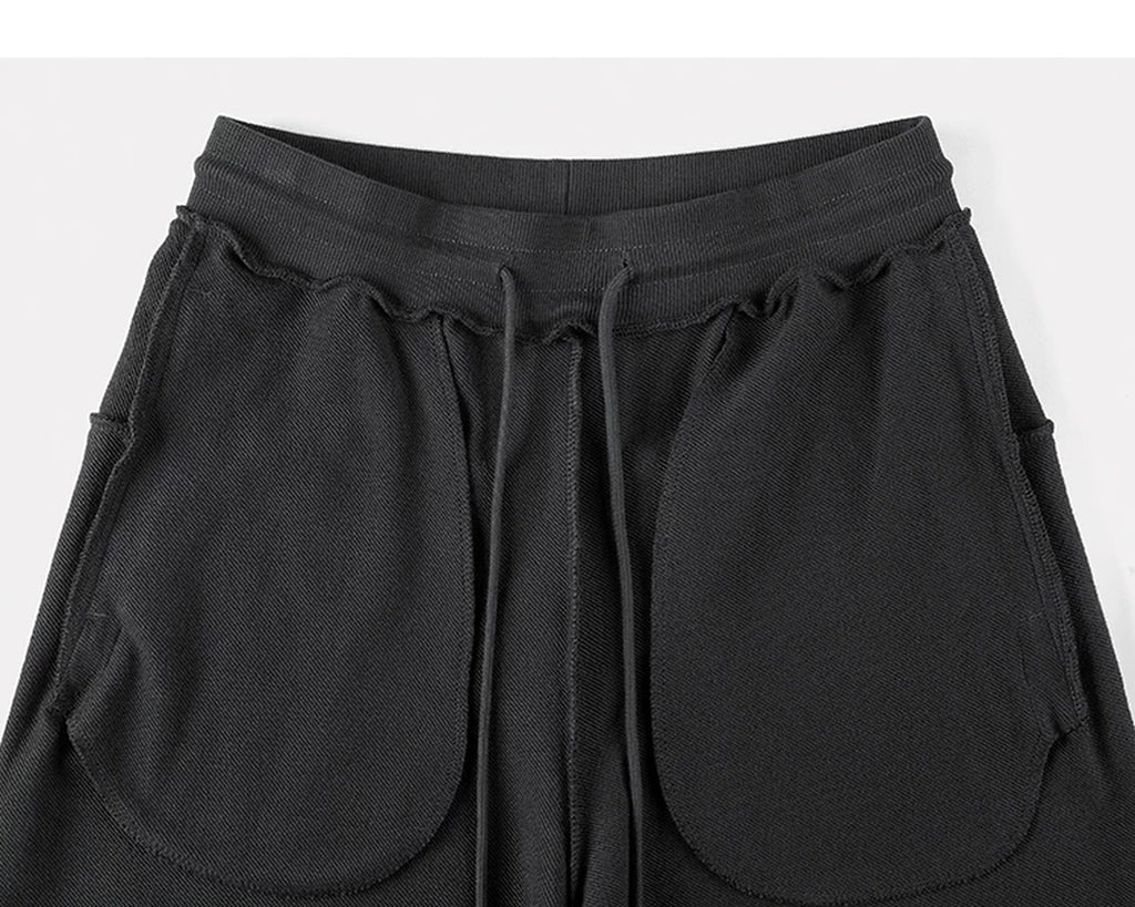 IDLT sweatpants, black inner pockets.